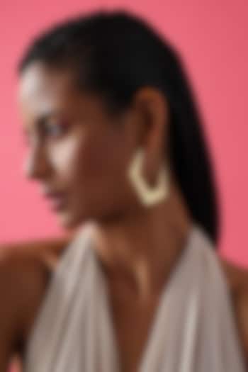 Gold Finish Hoop Earrings by Varnika Arora at Pernia's Pop Up Shop