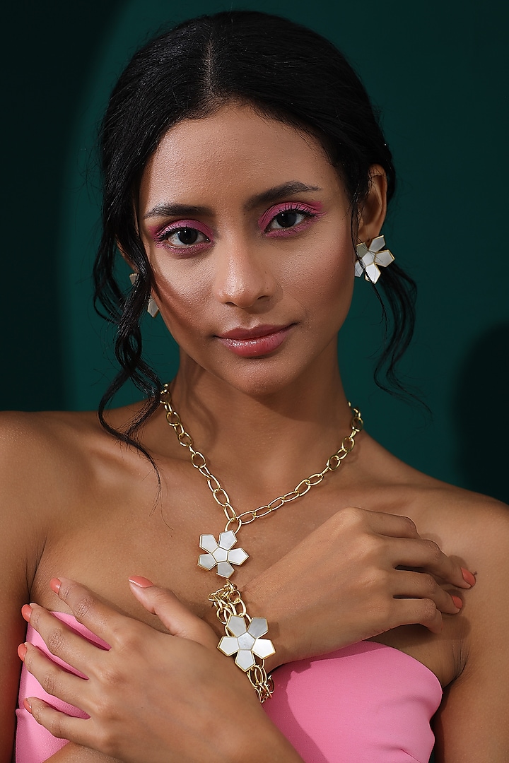 Gold Finish Mother Of Pearl Floral Bracelet by Varnika Arora at Pernia's Pop Up Shop