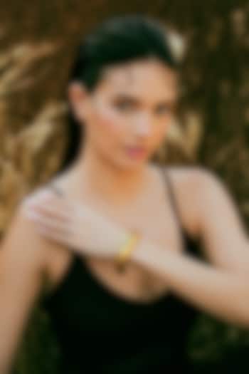 Gold Plated Black Enameled Circlet Bangle by Varnika Arora at Pernia's Pop Up Shop