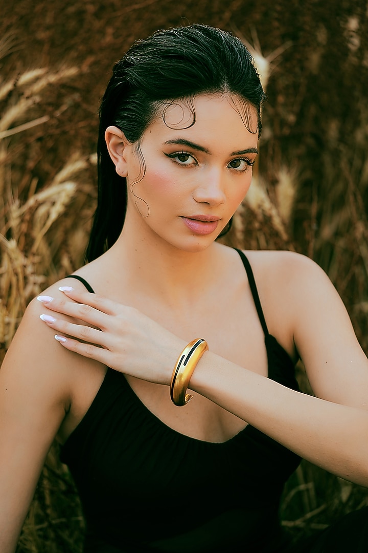 Gold Plated Black Enameled Circlet Bangle by Varnika Arora at Pernia's Pop Up Shop