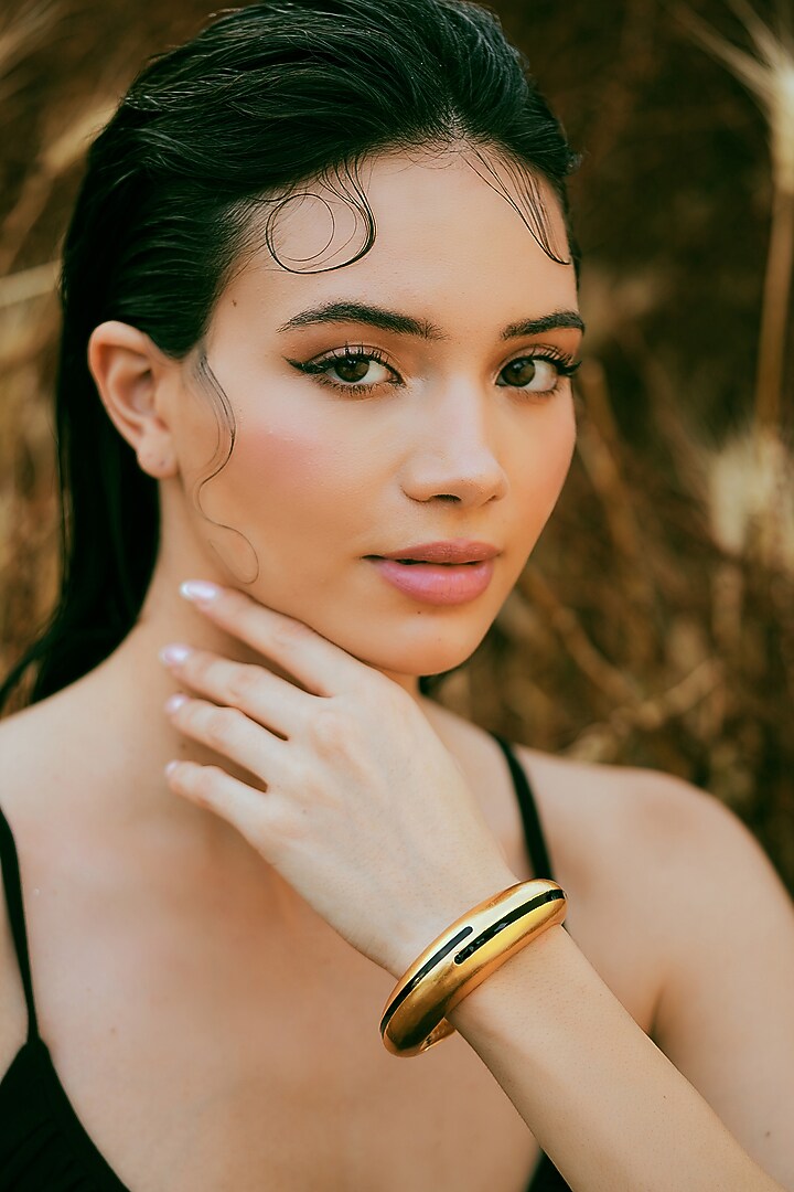 Gold Plated Black Enameled Circlet Bangle by Varnika Arora at Pernia's Pop Up Shop