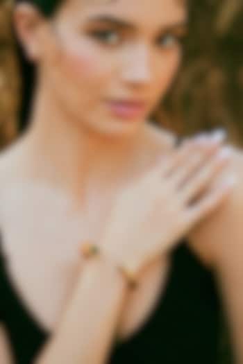 Gold Plated Black Enameled Cuff Bangle by Varnika Arora at Pernia's Pop Up Shop
