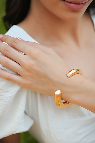 Gold Plated White Enameled Cuff Bangle by Varnika Arora