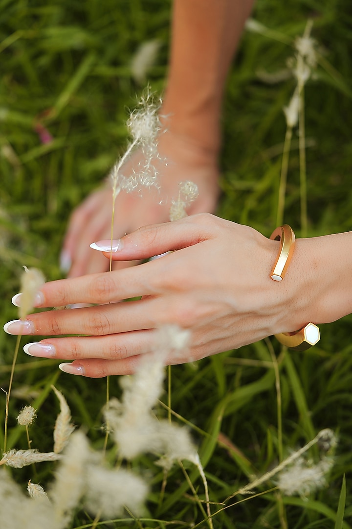 Gold Plated White Enameled Cuff Bangle by Varnika Arora at Pernia's Pop Up Shop