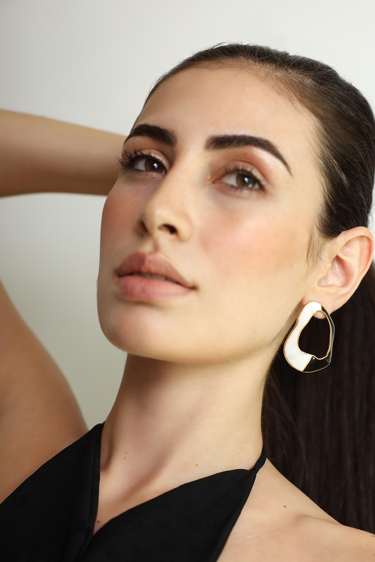 Gold Finish Enameled Cascade Stud Earrings by Varnika Arora at Pernia's Pop Up Shop
