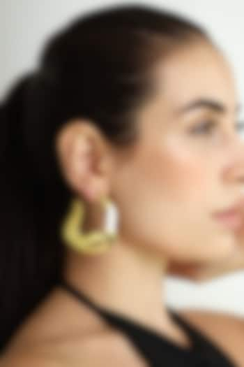 Gold Finish Abstract Wave Stud Earrings by Varnika Arora at Pernia's Pop Up Shop