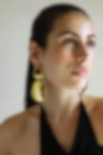 Gold Finish Fluid Curved Dangler Earrings by Varnika Arora