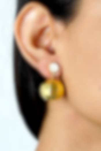 Gold Finish White Mother Of Pearl Earrings by Varnika Arora