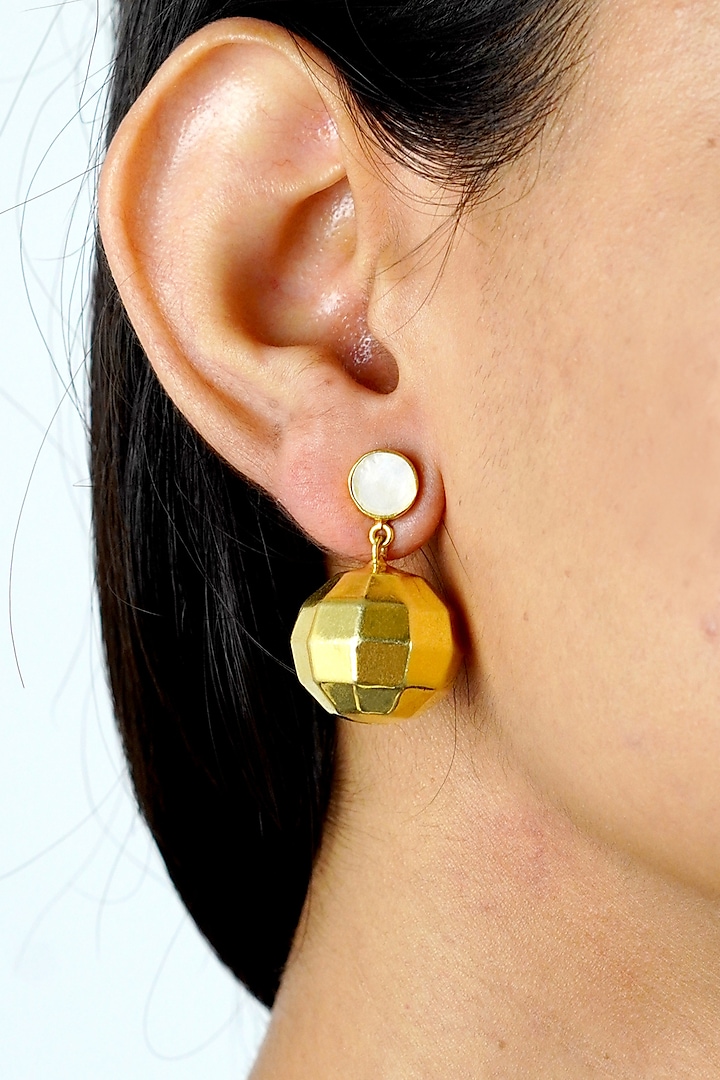 Gold Finish White Mother Of Pearl Earrings by Varnika Arora