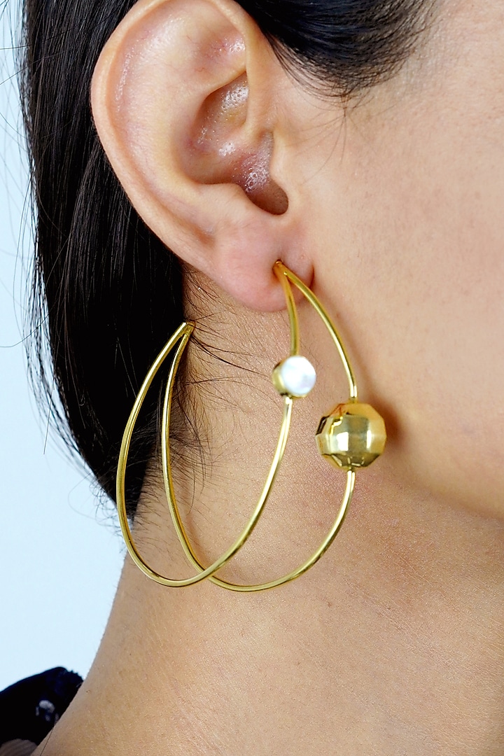 Gold Finish White Mother Of Pearl Hoop Earrings by Varnika Arora