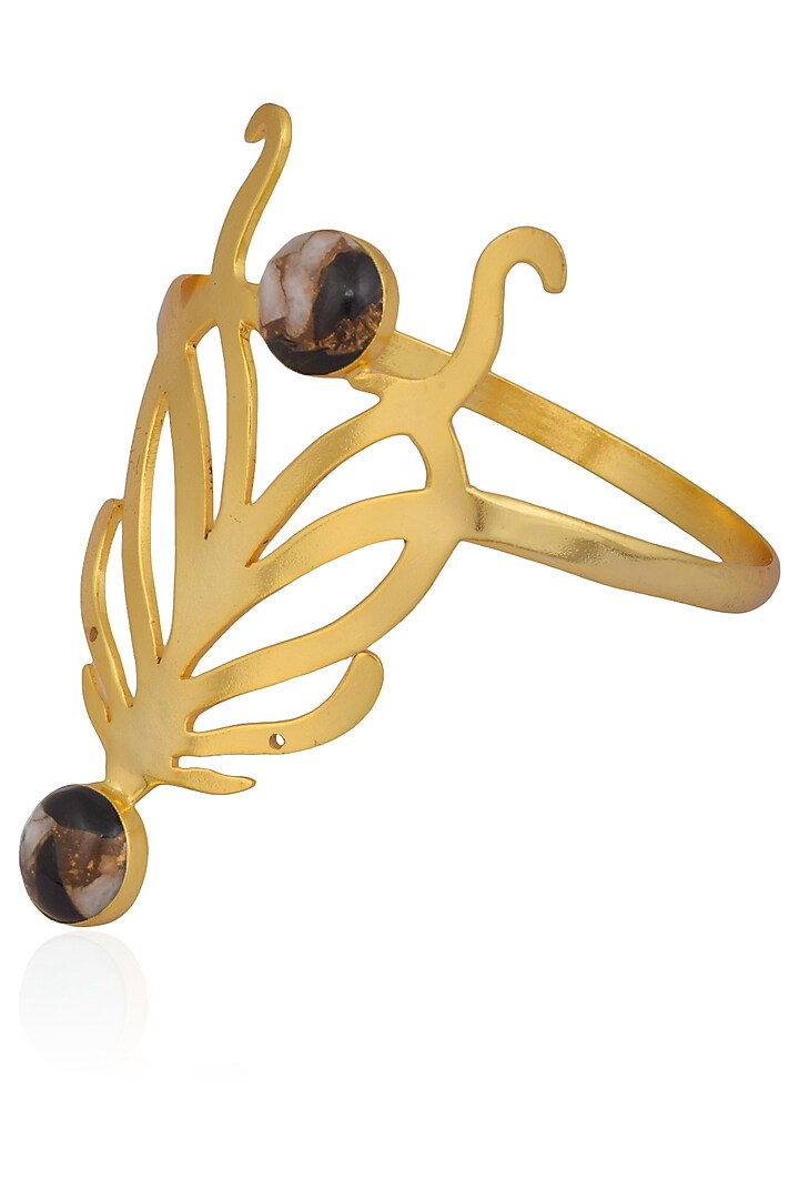 Varnika Arora presents Gold plated cabochon mohave copper mix stone statement wrist palmcuff available only at Pernia's Pop Up Shop.