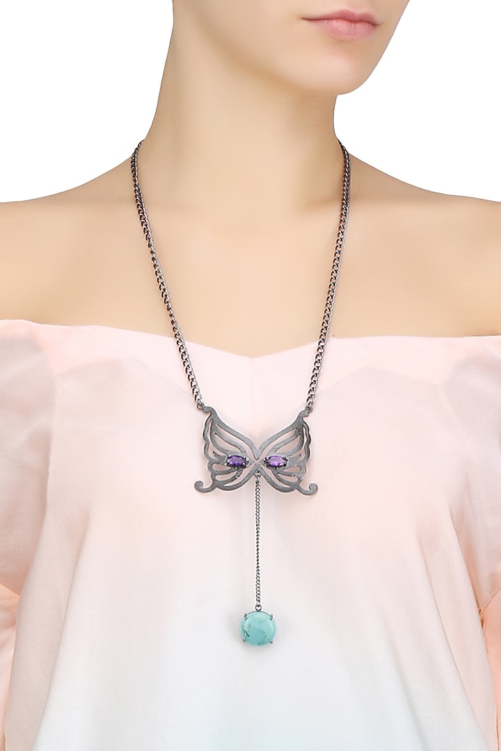 Varnika Arora presents Black plated amethyst and turquoise butterfly pendant necklace available only at Pernia's Pop Up Shop.