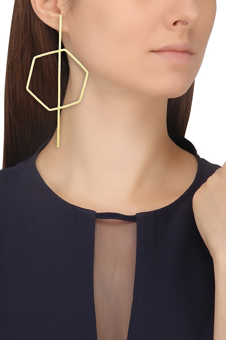 Gold finish hexagon stinger earrings available only at Pernia's Pop Up Shop.