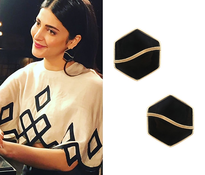Gold finish black mother of pearl hexagon earrings available only at Pernia's Pop Up Shop.