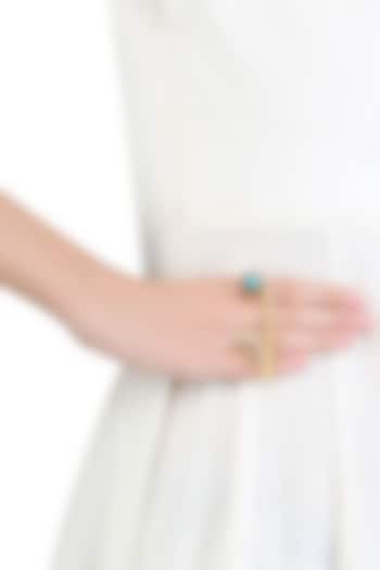 Varnika Arora presents Gold plated labrodite stone two finger ring available only at Pernia's Pop Up Shop.