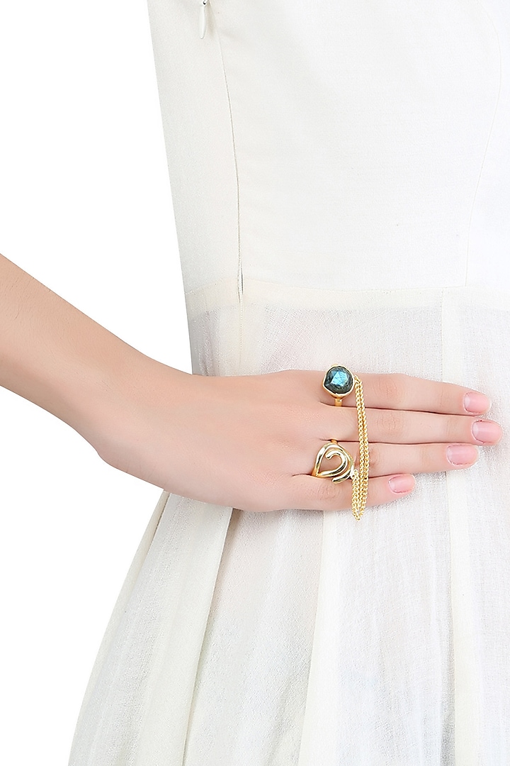 Gold plated labrodite stone two finger ring by Varnika Arora