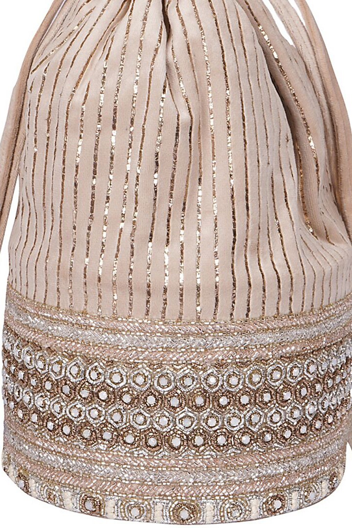Cream Suede Pitta Embroidered Potli by Veruschka By Payal Kothari at Pernia's Pop Up Shop