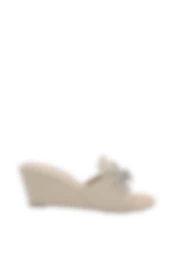 Cream Faux Leather Wedges by Veruschka By Payal Kothari