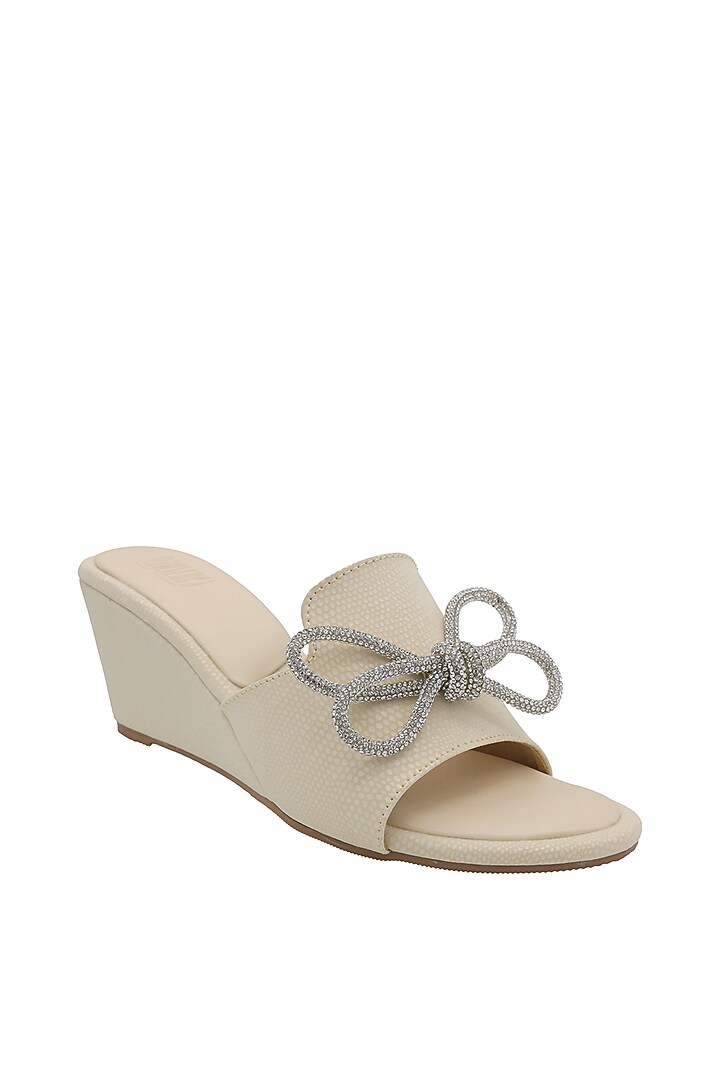 Cream Faux Leather Wedges by Veruschka By Payal Kothari at Pernia's Pop Up Shop