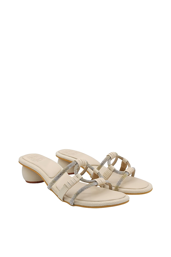 Cream Faux Leather Embellished Sandals by Veruschka By Payal Kothari at Pernia's Pop Up Shop