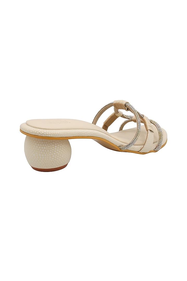 Cream Faux Leather Embellished Sandals by Veruschka By Payal Kothari at Pernia's Pop Up Shop