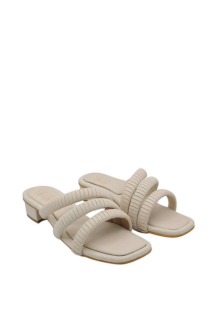 Cream Strappy Faux Leather Sandals by Veruschka By Payal Kothari at Pernia's Pop Up Shop