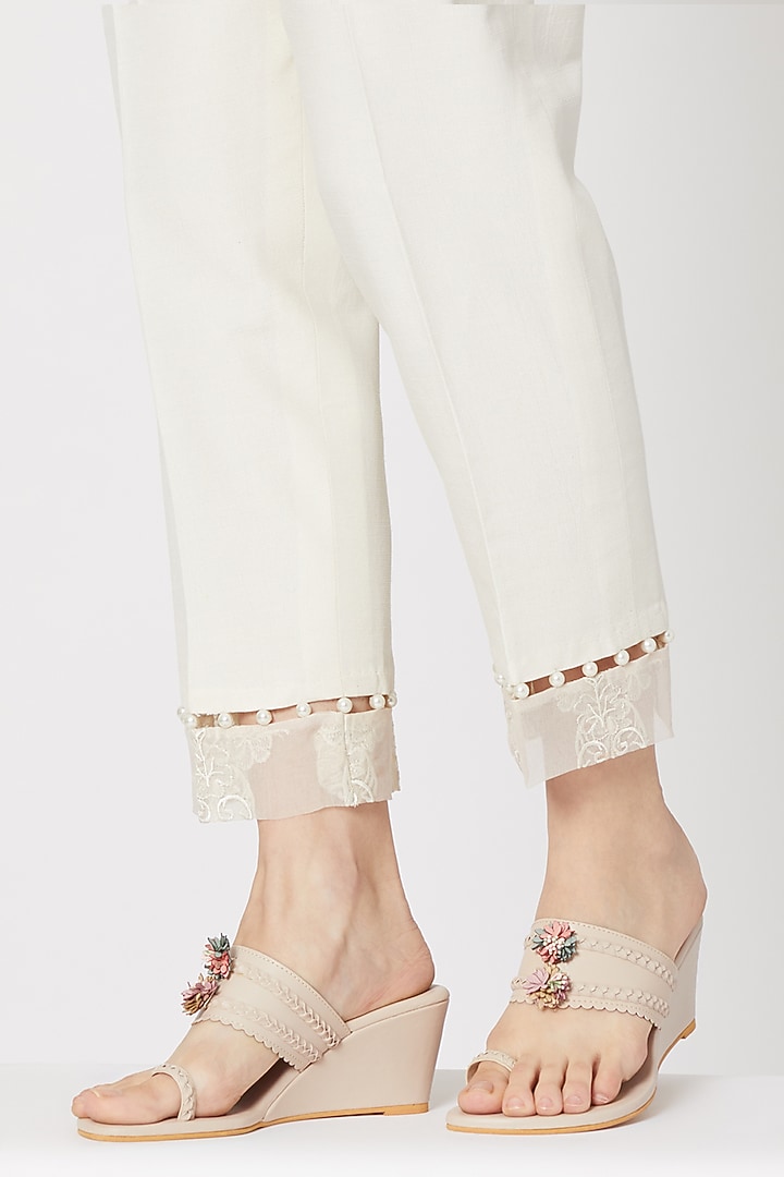 Cream Embroidered Kohlapuri Wedges by Veruschka By Payal Kothari at Pernia's Pop Up Shop