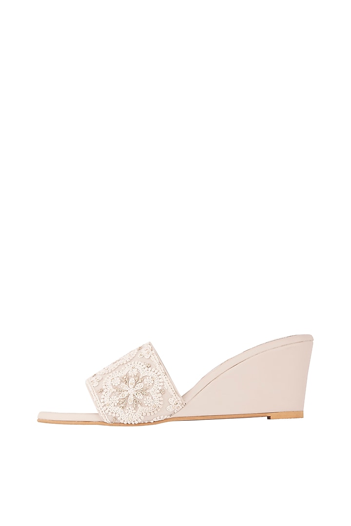 Cream Embroidered Slip-on Wedges by Veruschka By Payal Kothari at Pernia's Pop Up Shop