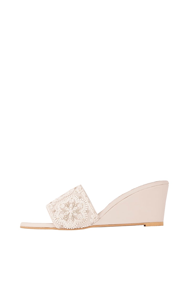 Cream Embroidered Slip-on Wedges by Veruschka By Payal Kothari