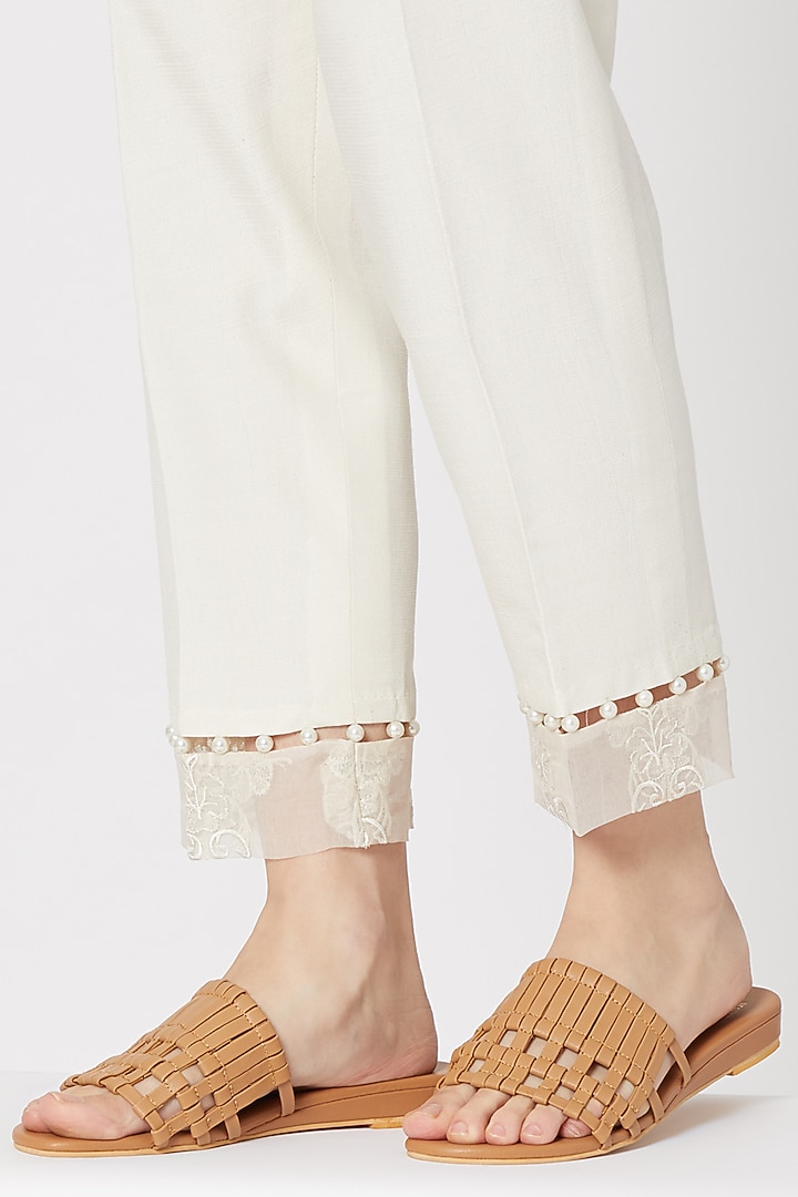 Tan Weaved Slip-On Wedges by Veruschka By Payal Kothari at Pernia's Pop Up Shop
