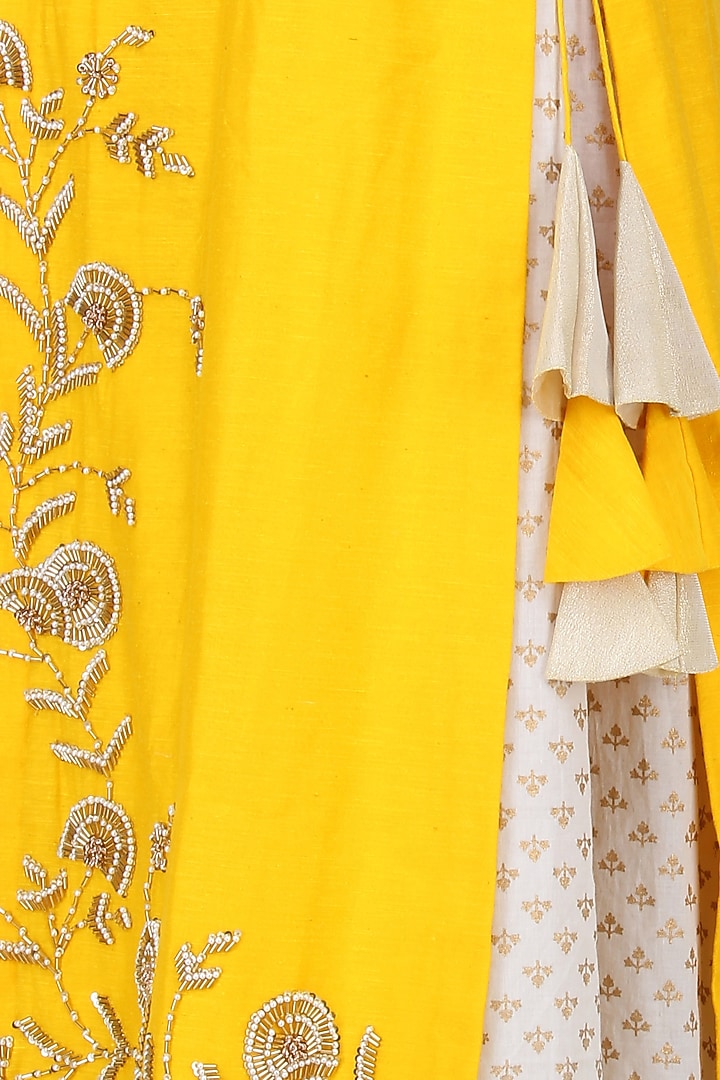 Off white and yellow printed kurta set with embroidered jacket available only at Pernia's Pop Up Shop.