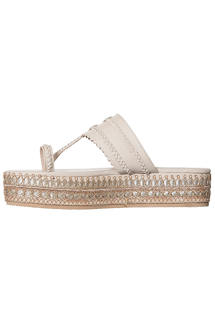 Beige embroidered platform kolhapuris available only at Pernia's Pop Up Shop.
