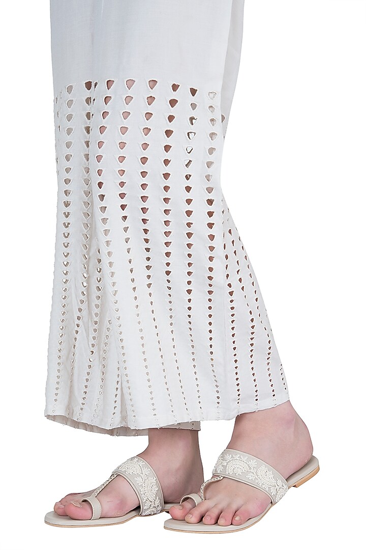 White and beige embroidered kolhapuri sandals available only at Pernia's Pop Up Shop.