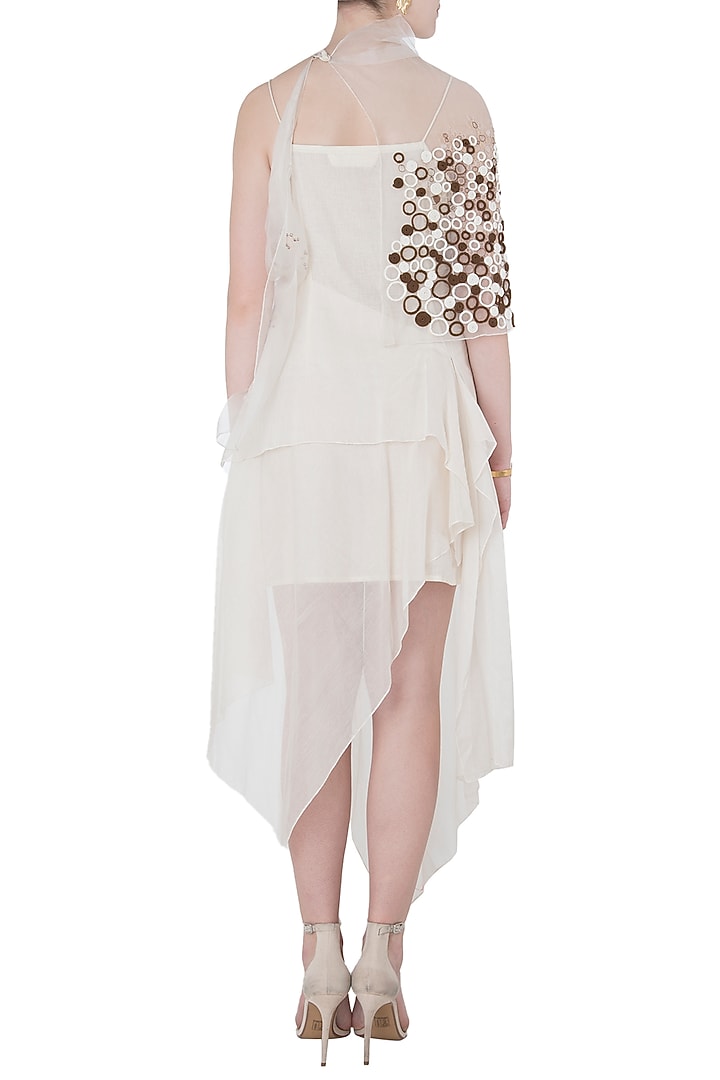 White dress with asymmetrical cape jacket available only at Pernia's Pop Up Shop.