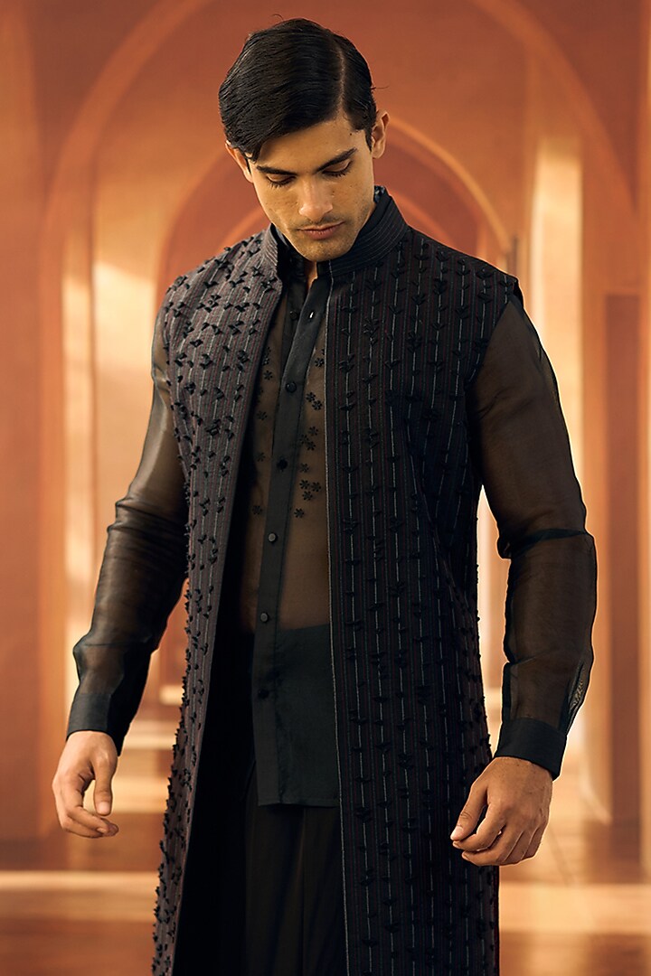 Black Semi Raw Silk Machine Embroidered Sleeveless Open Wedding Sherwani by Vivek Karunakaran at Pernia's Pop Up Shop