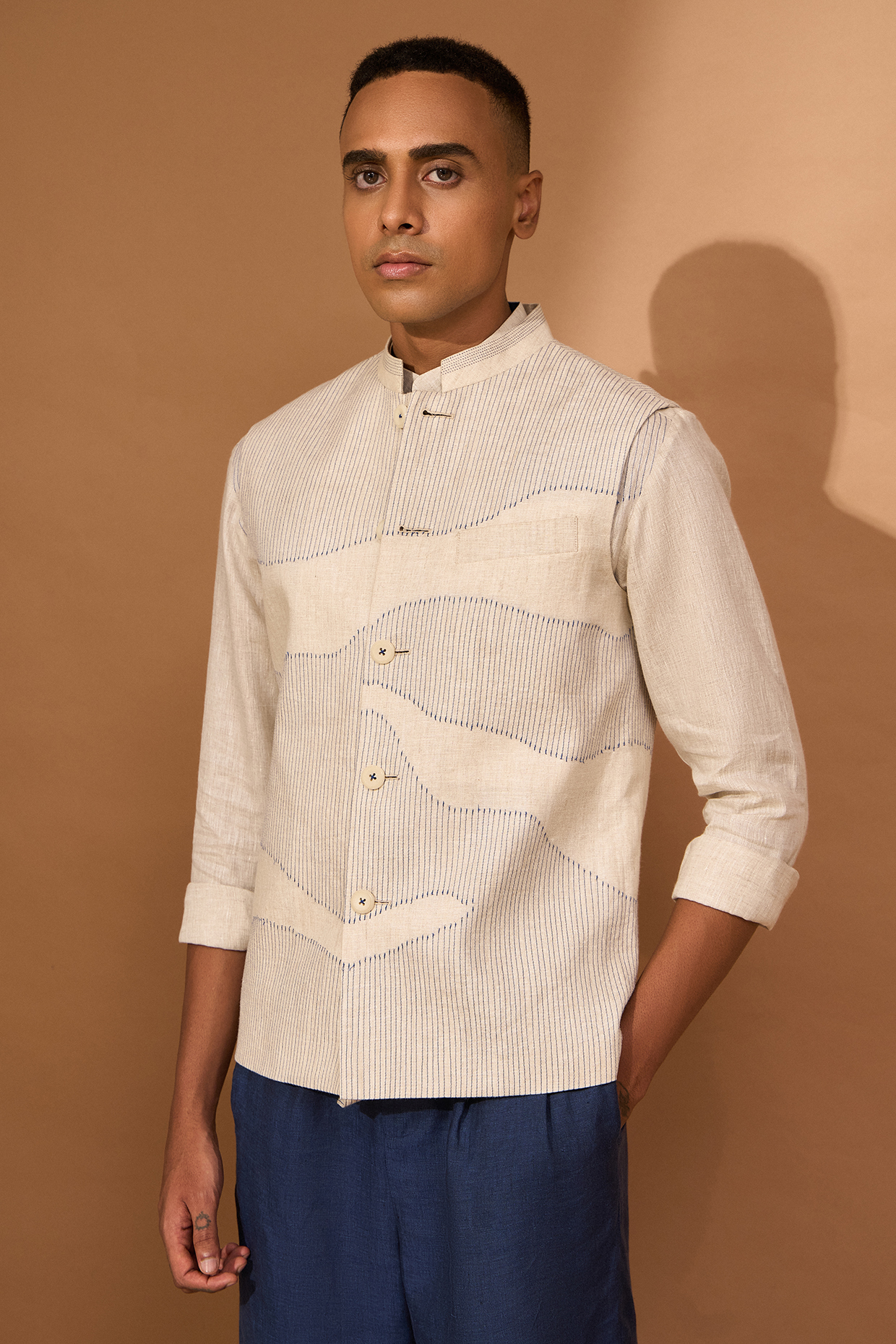 Beige Linen Topstitch Nehru Jacket by Vivek Karunakaran
