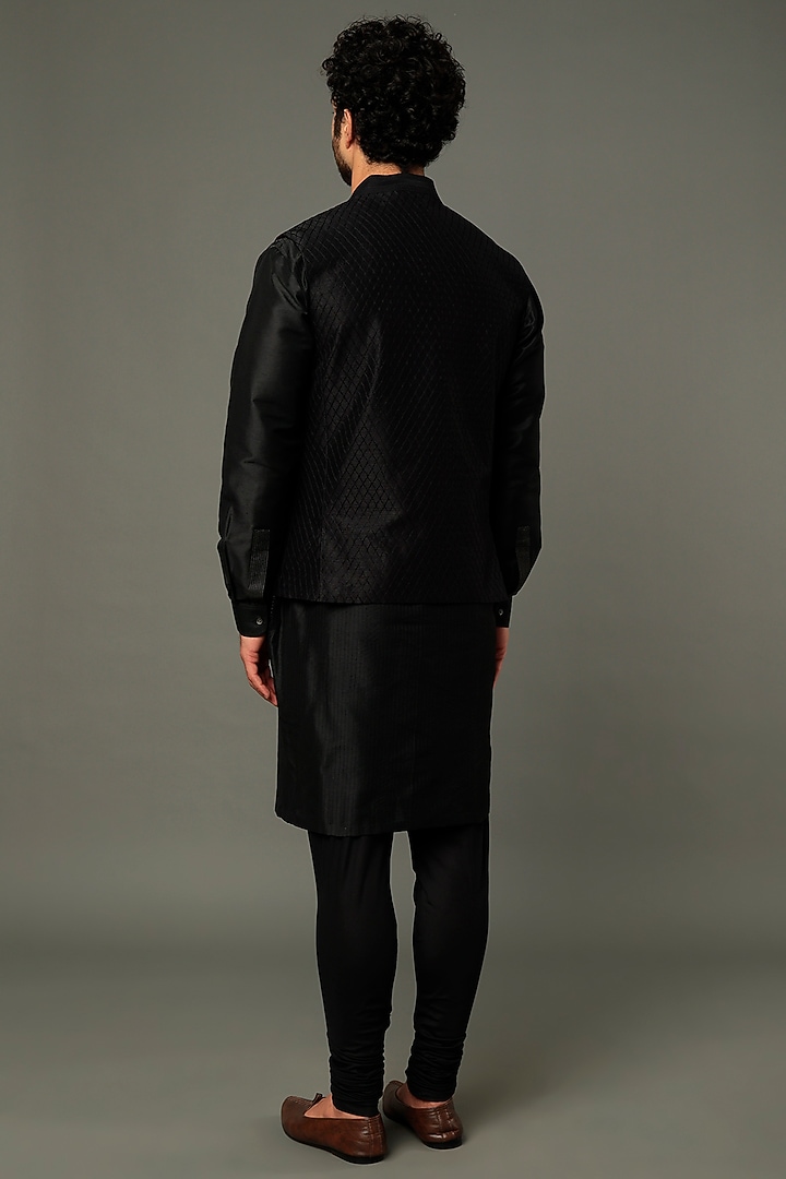Black Raw Silk Aari Embroidered Bundi Jacket by Vivek Karunakaran at Pernia's Pop Up Shop