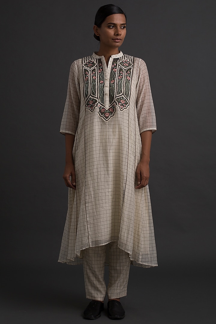 Ivory Floral Embroidered A-Line Tunic  by Varq By Varun Nidhika