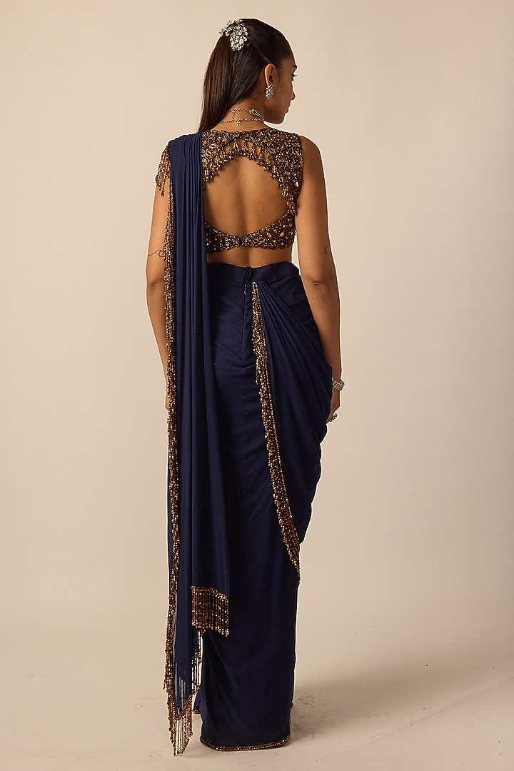 Deep Blue Georgette Silver Tassels Draped Reception Saree Set by Vvani By Vani Vats at Pernia's Pop Up Shop