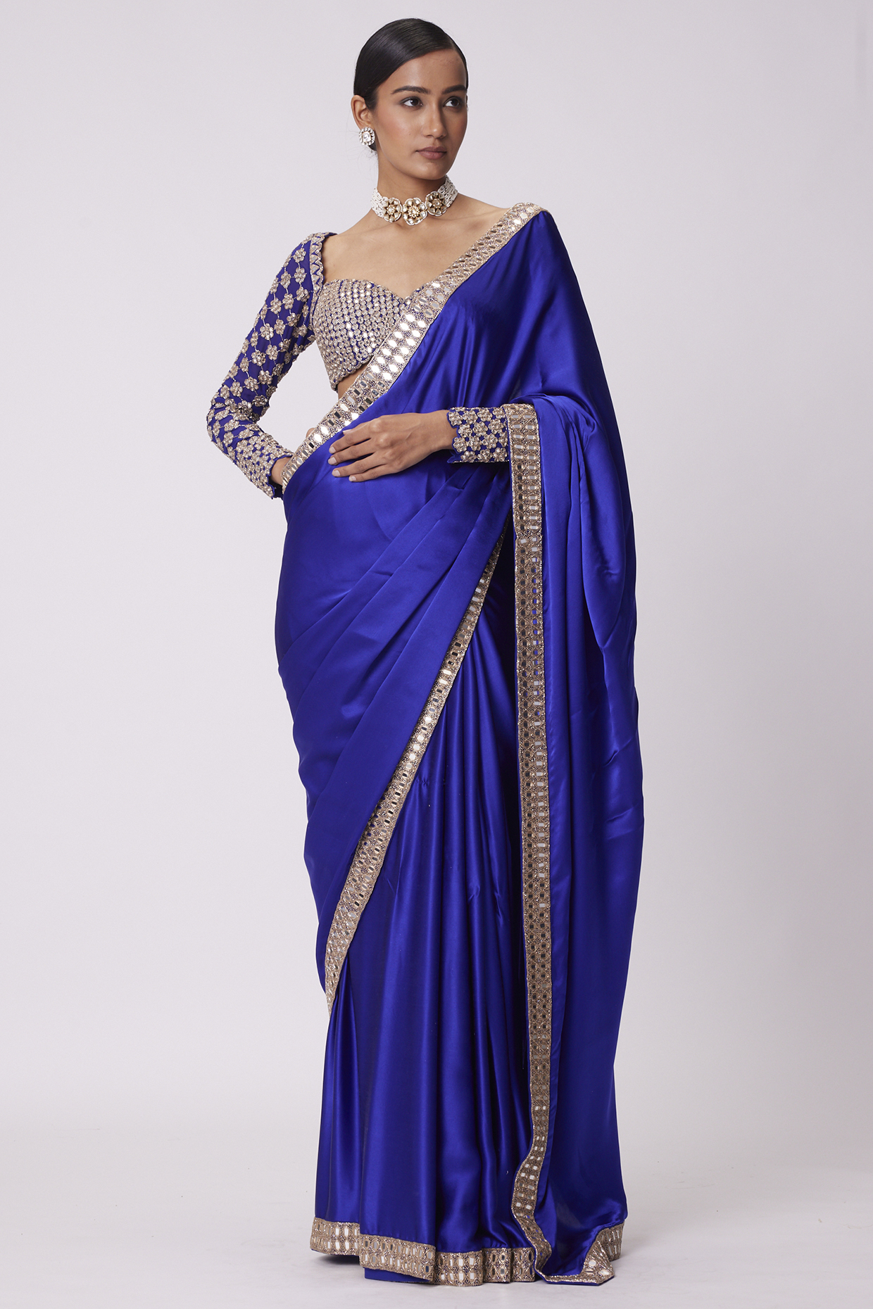 Persian Blue Georgette Mirror Hand Embroidered Saree Set by Vvani By Vani Vats