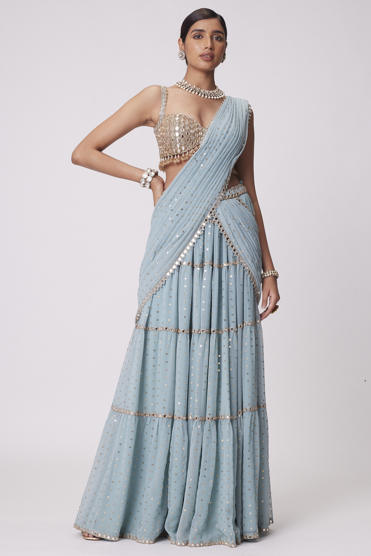 Powder Blue Georgette Mirror Hand Embroidered Tiered Saree Set by Vvani By Vani Vats