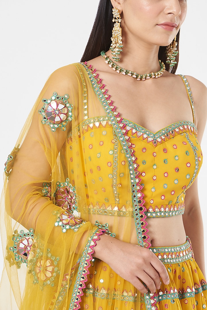 Yellow Georgette Tiered Wedding Lehenga Set by Vvani by Vani Vats at Pernia's Pop Up Shop