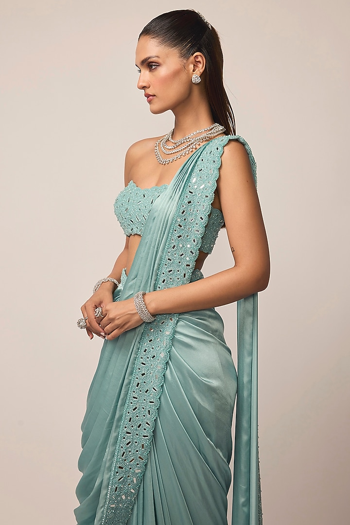 Powder Blue Satin Mirror Embroidered Reception Saree Set by Vvani by Vani Vats at Pernia's Pop Up Shop