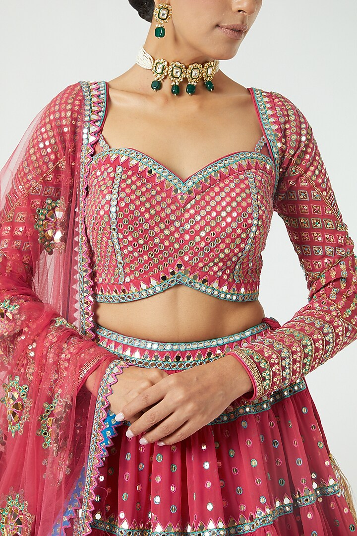Deep Coral Georgette Sequined Tiered Wedding Lehenga Set by Vvani By Vani Vats at Pernia's Pop Up Shop