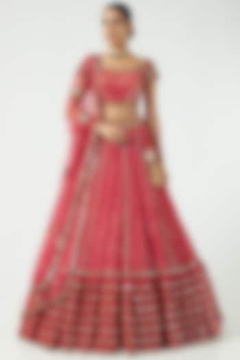 Deep Coral Georgette Sequined Tiered Lehenga Set by Vvani By Vani Vats
