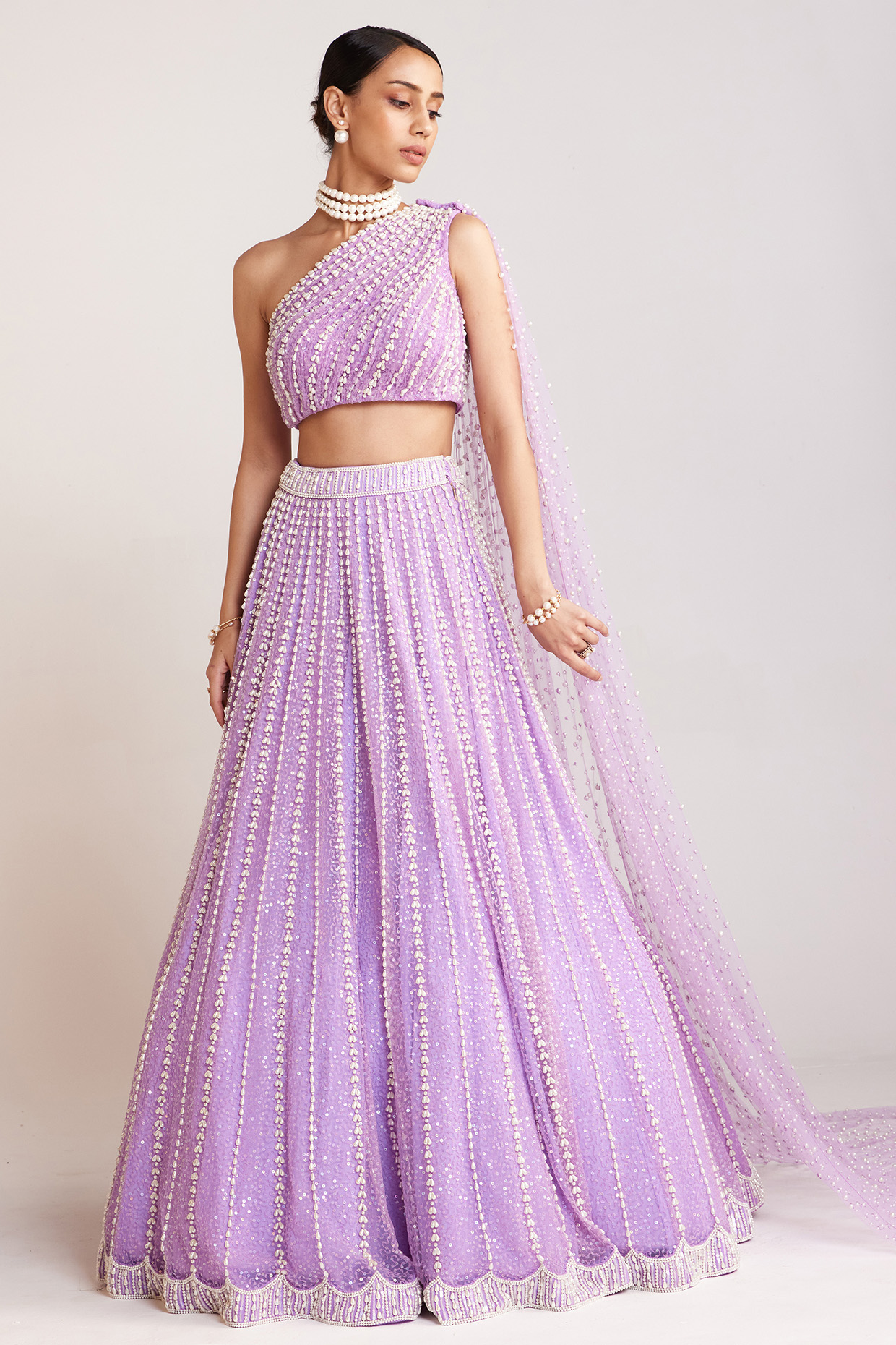 Lilac Net Pearl Embellished Lehenga Set by Vvani By Vani Vats