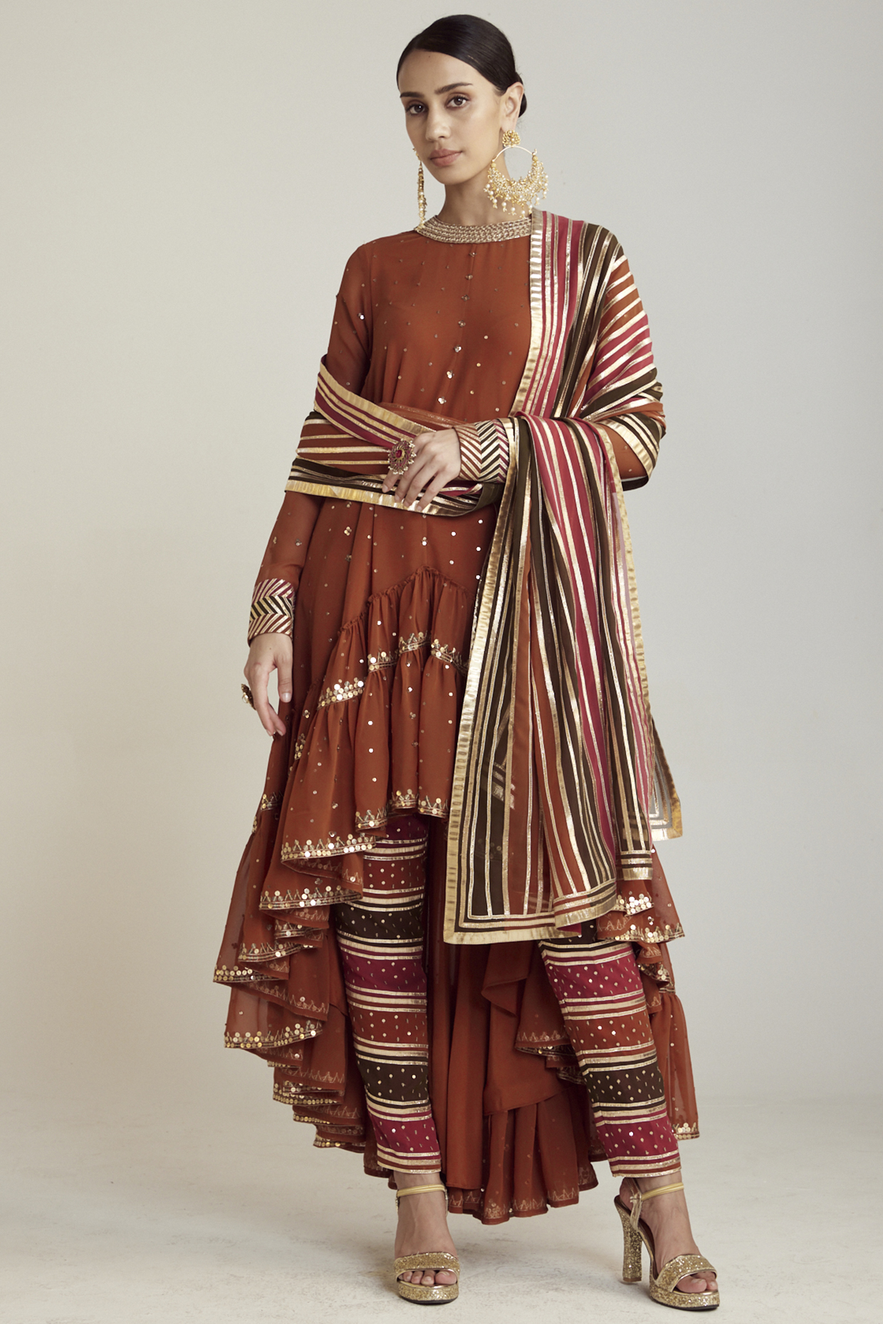 Rust Georgette Asymmetrical Kurta Set by Vvani by Vani Vats at Pernia's Pop Up Shop