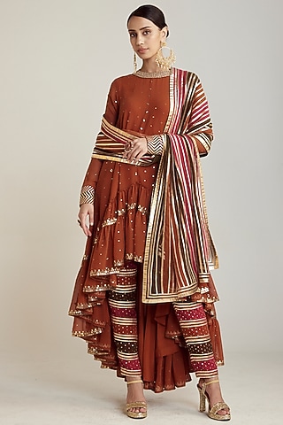Rust Georgette Asymmetrical Kurta Set by Vvani by Vani Vats