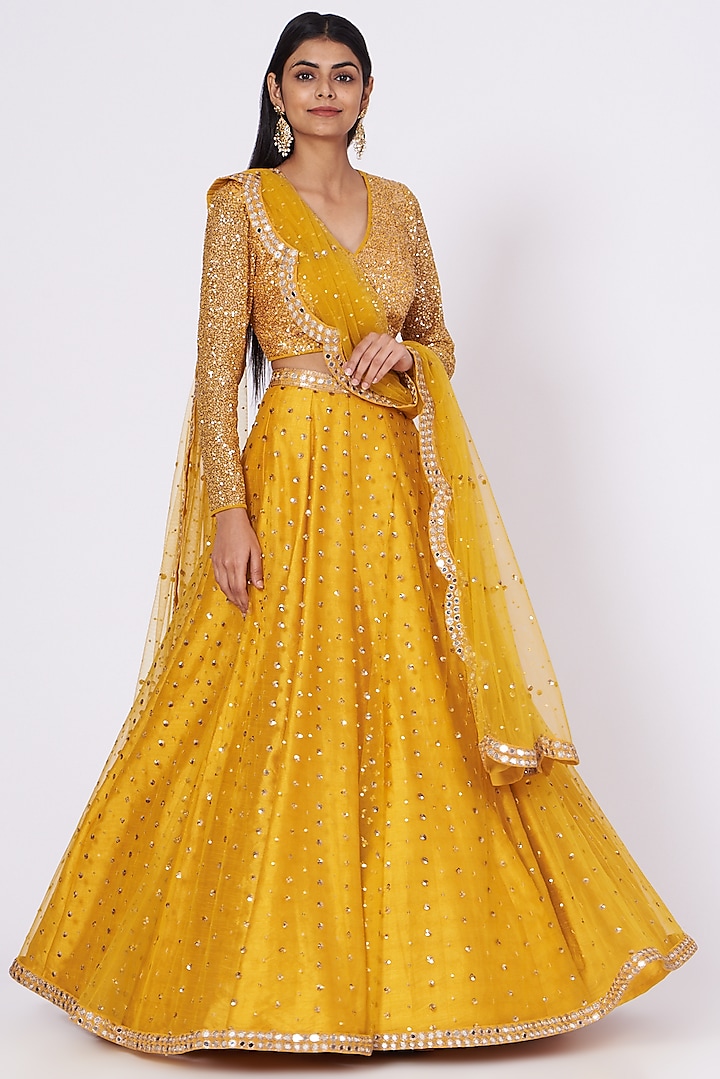 Mustard Net Mirror Hand Embroidered Wedding Lehenga Set by Vvani by Vani Vats at Pernia's Pop Up Shop