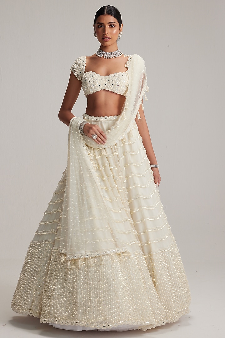 Off-White Organza Mirror & Pearl Embroidered Bridal Lehenga Set by Vvani By Vani Vats at Pernia's Pop Up Shop
